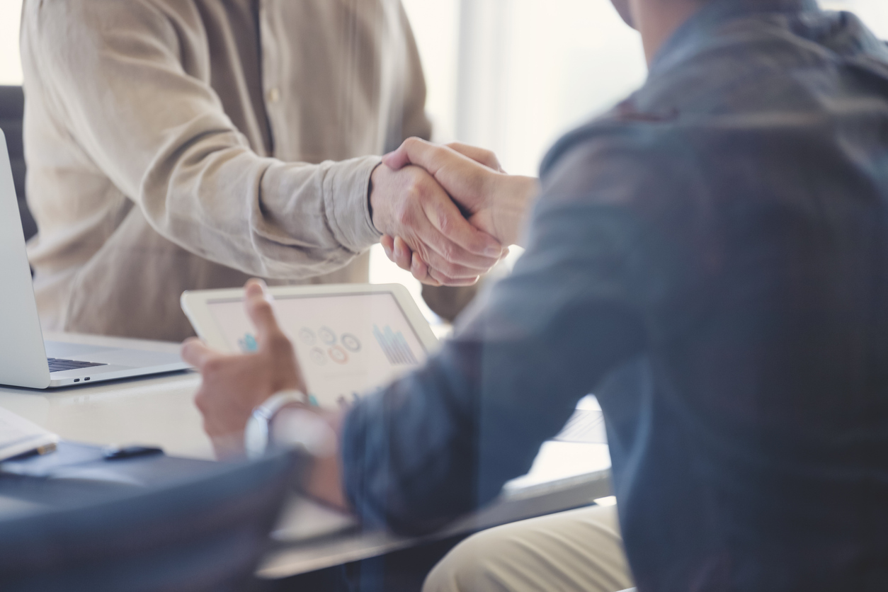 Reseller shaking hands